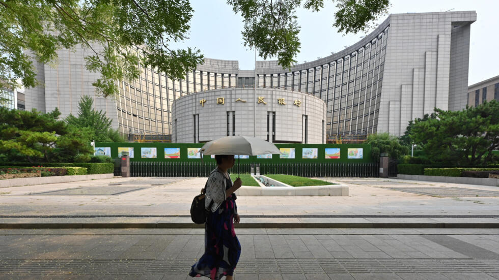 China's central bank cuts two key rates to boost economy