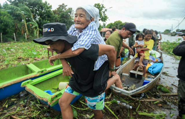 Philippines races to reach stranded as storm's death toll rises