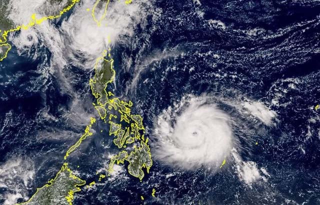 As Philippines picks up from Usagi, a fresh storm bears down