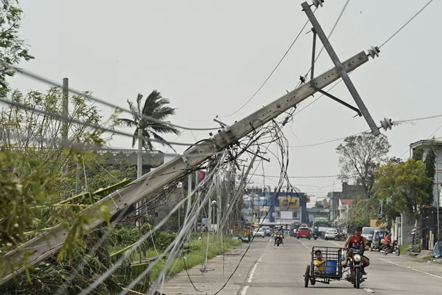 Super Typhoon Man-yi fells trees, power lines in the Philippines