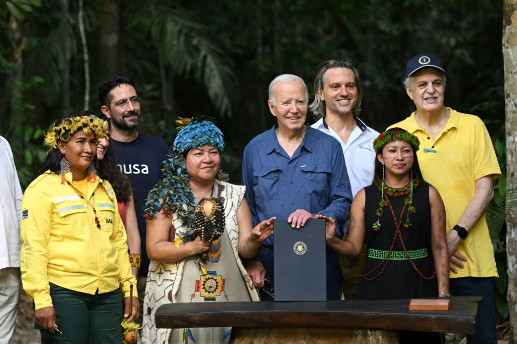 Biden touts climate legacy in landmark Amazon visit