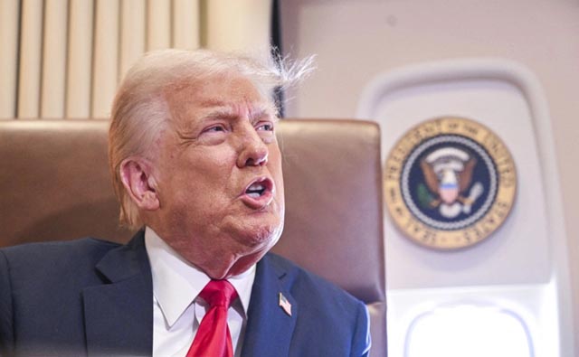 Trump purges national security team after meeting conspiracist