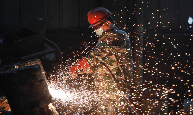 China's manufacturing shrinks in April as trade war bites