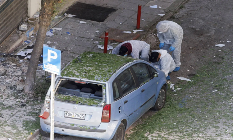 Woman dies after blast near bank in Greece