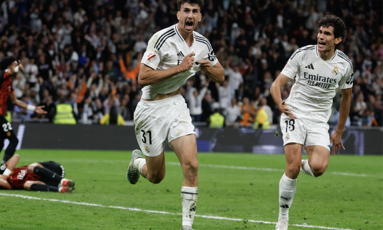 Real Madrid delay Barca celebrations with late Liga win over Mallorca