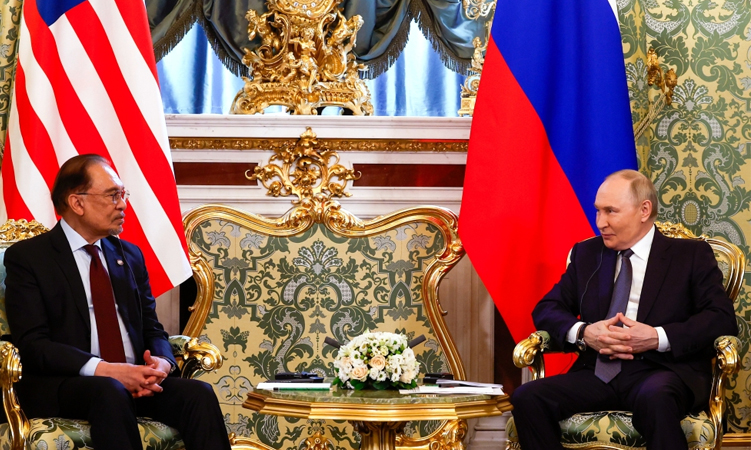 Anwar says raised MH17 downing with Putin in Moscow