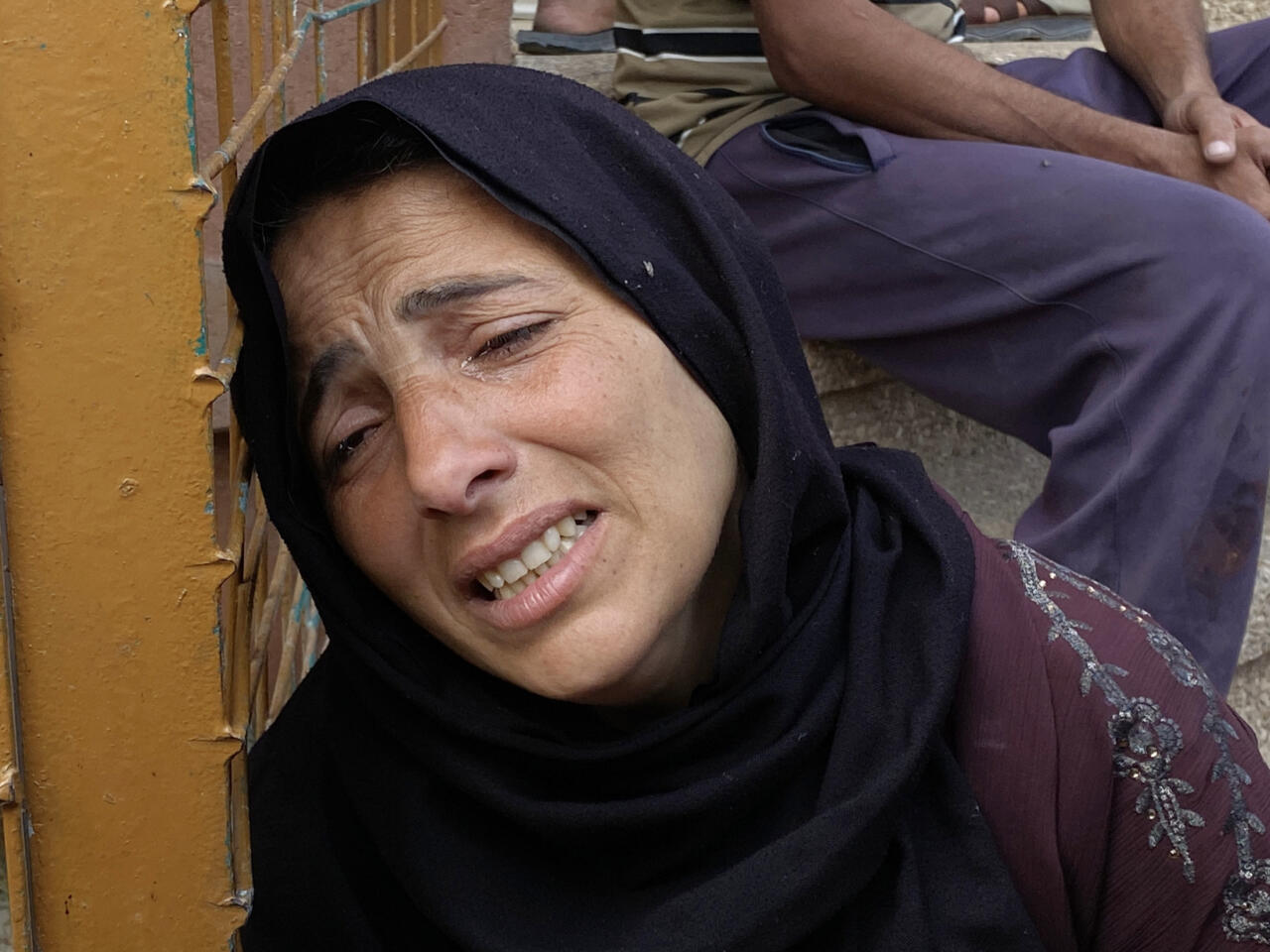 Gaza air strikes kill 94 as manhunt unfolds in West Bank