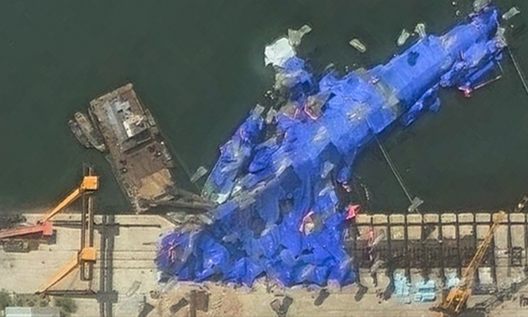 N. Korea detains three over warship launch accident: KCNA