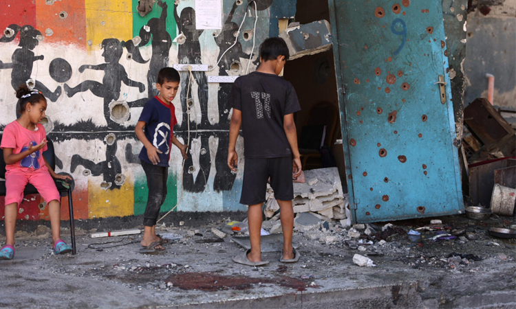 Gaza rescuers say 13 killed in Israeli strike on school