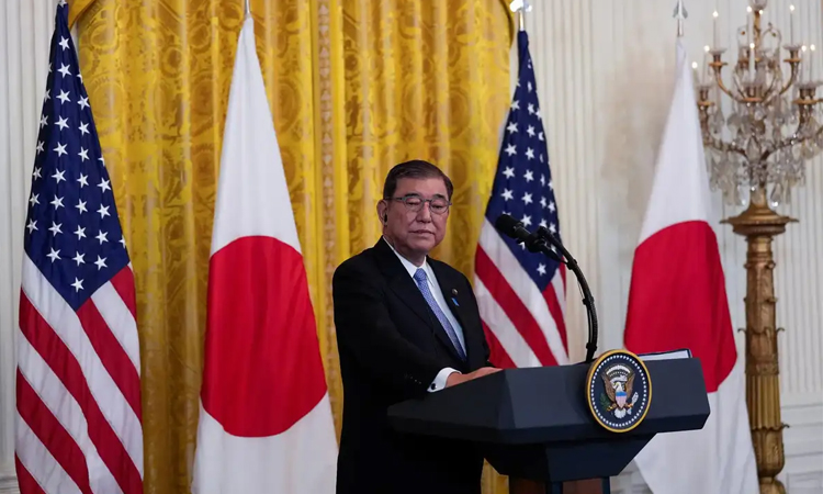 Japan says US tariff talks to 'accelerate'
