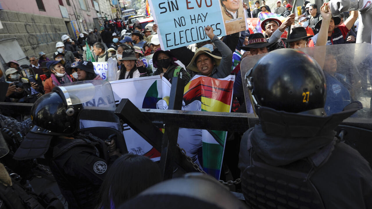 20 detained, officers injured as Morales supporters clash with police in Bolivia