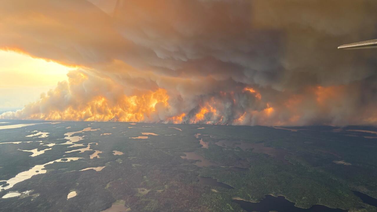 Canadian wildfire emergency spreads to second province