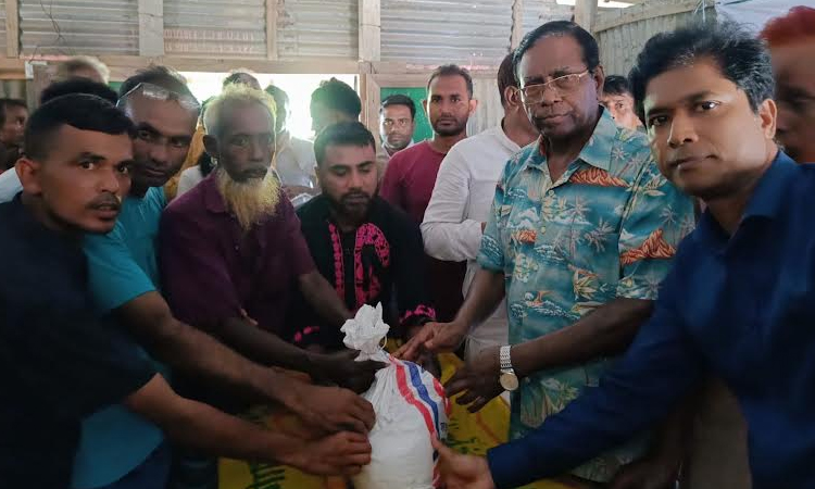 Food items distributed among storm hit people in Jamalpur 