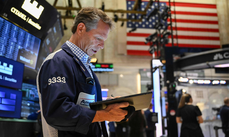 US stocks end higher as traders shake off trade tensions