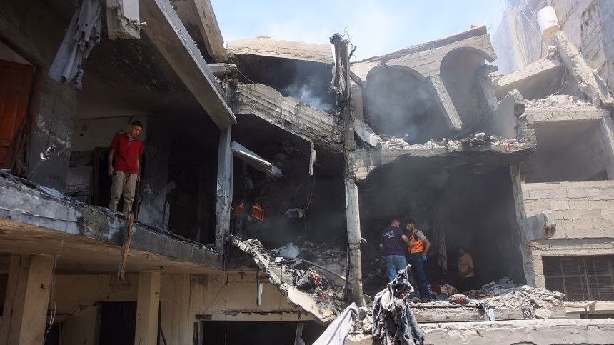 Rescuers say Israeli fire kills at least 27 near Gaza aid point