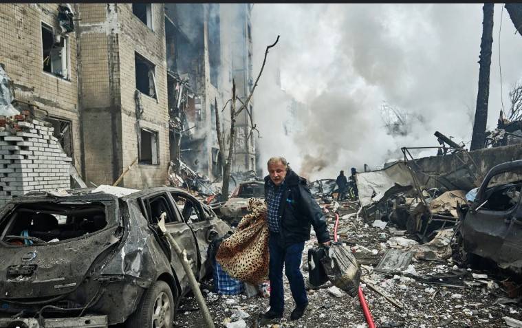 Russian attack kills four in Kyiv after Putin retaliation vow