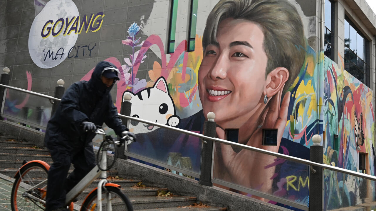 Two BTS megastars released from South Korea military