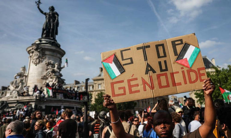 Macron calls for release of Gaza activists as thousands demonstrate