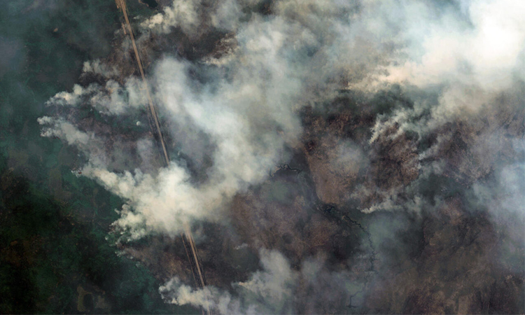 Canada town near Vancouver ready to evacuate as fire approaches