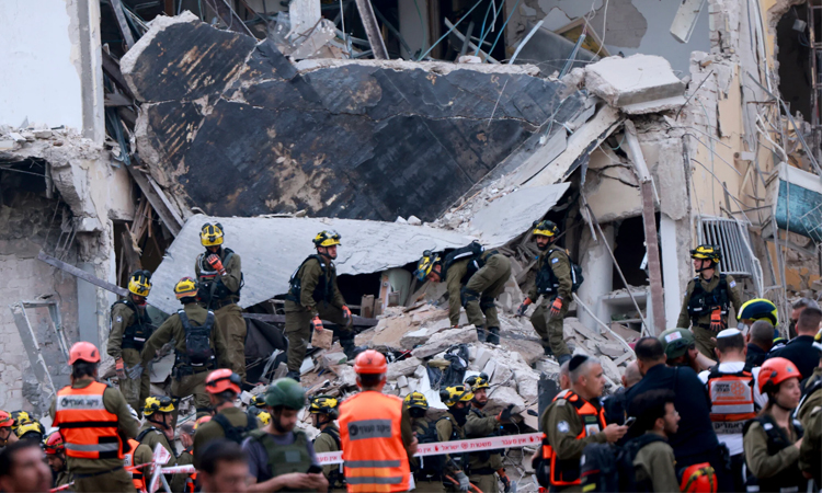 Israeli rescuers say latest Iran strikes kill five, wound 92