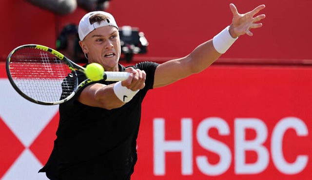 Tiafoe crashes out, Rune cruises through at Queen's Club
