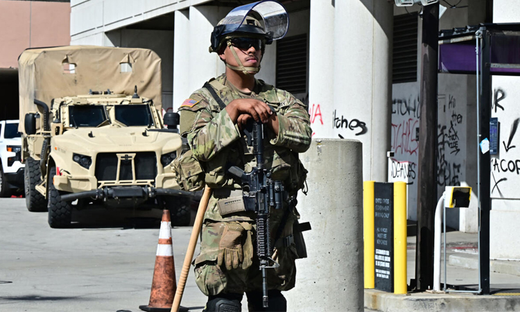 Curfew lifted in LA as Trump battles for control of California troops