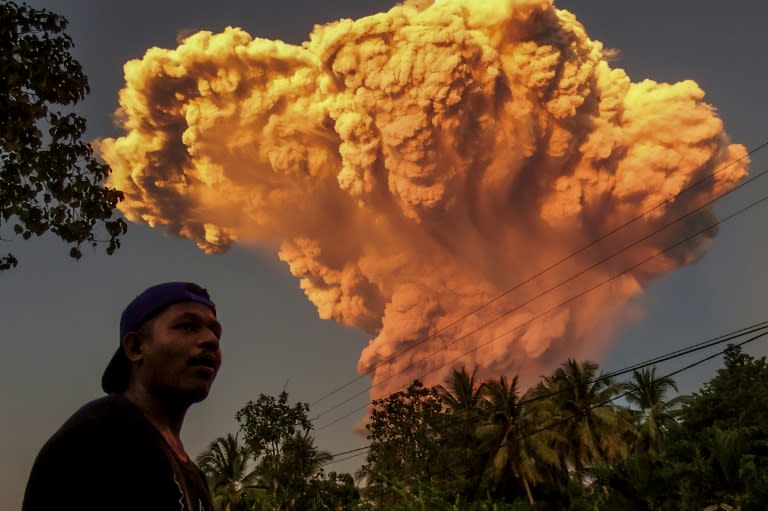 Dozens of Bali flights cancelled after Indonesia volcano erupts