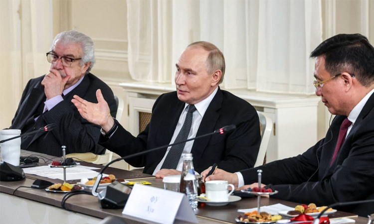 Putin says NATO rearmament not a 'threat' to Russia