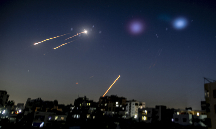 Israel says striking military sites in west Iran      