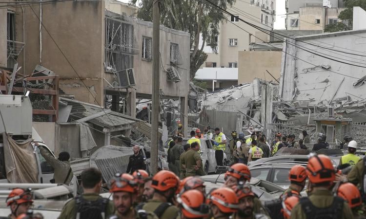 Israel rescuers say three dead, two wounded in Iranian missile strike