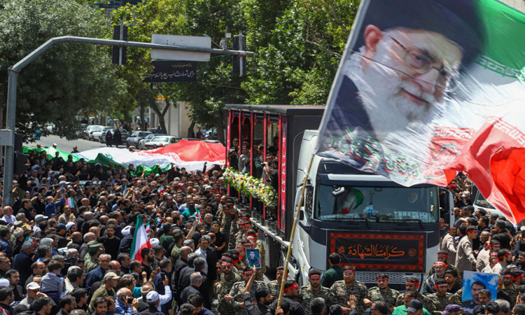Iran holds state funeral for top brass slain in war with Israel