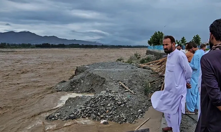 Pakistan flash floods and heavy rains kill 24