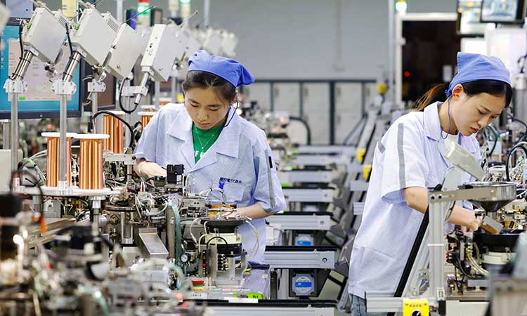 China manufacturing shrinks in June despite trade war respite