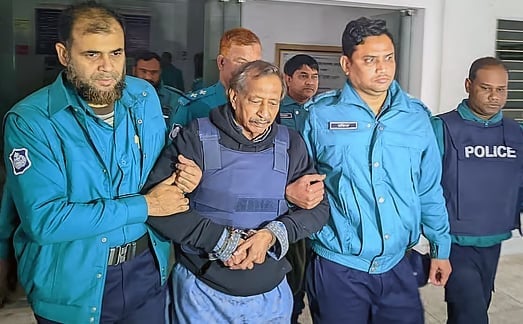Court freezes 57 bank accounts of ex-minister Nuruzzaman, wife
