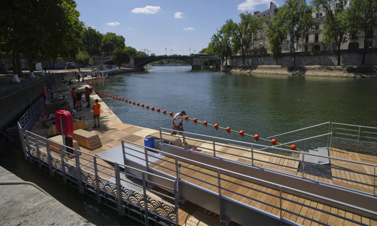 Seine reopens to first Paris swimmers after century-long ban