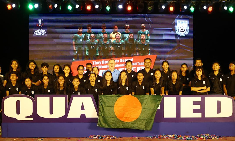 Women's football team return home with heads held high