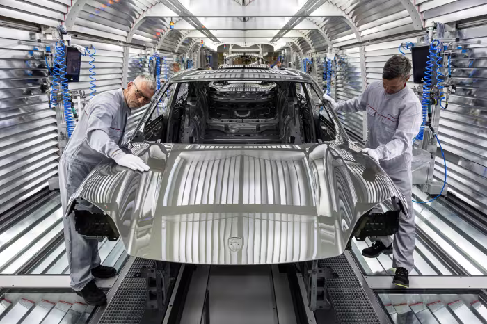 German factory output up but tariff threat looms