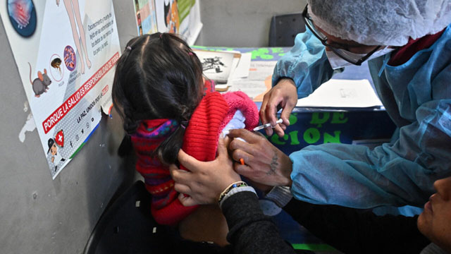 Medical groups sue US health secretary over Covid-19 vaccine change