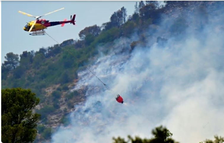 Spain lifts lockdown for thousands as forest fire eases