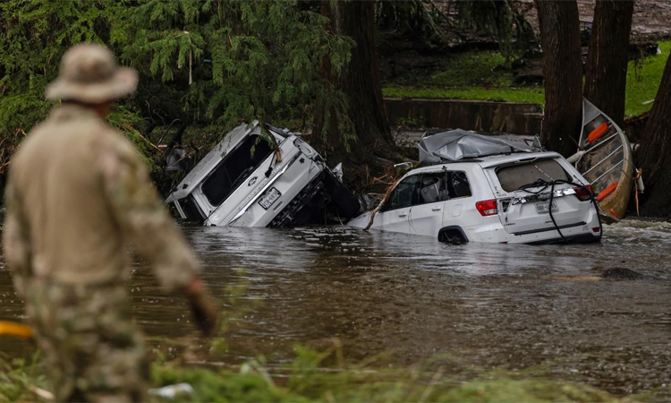 Trump flies to flood-ravaged Texas as scrutiny of response mounts