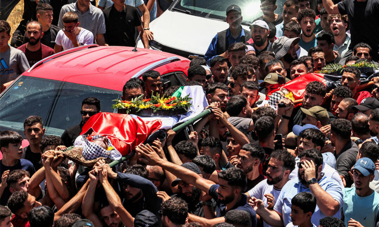 Anger in West Bank village at funeral of two young men