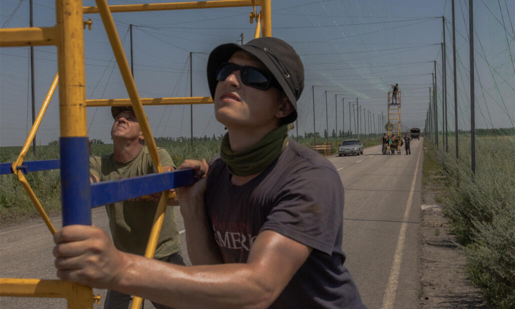 Ukraine covers frontline roads with anti-drone nets