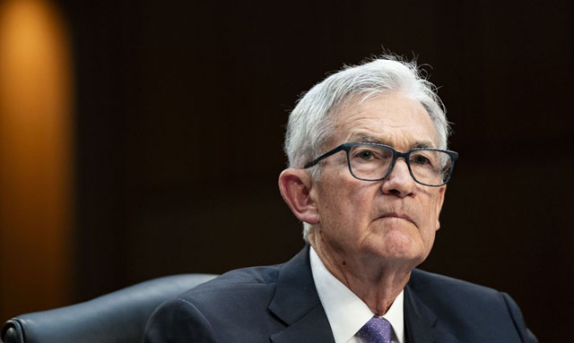 US stocks finish higher as markets gyrate on Powell firing fears