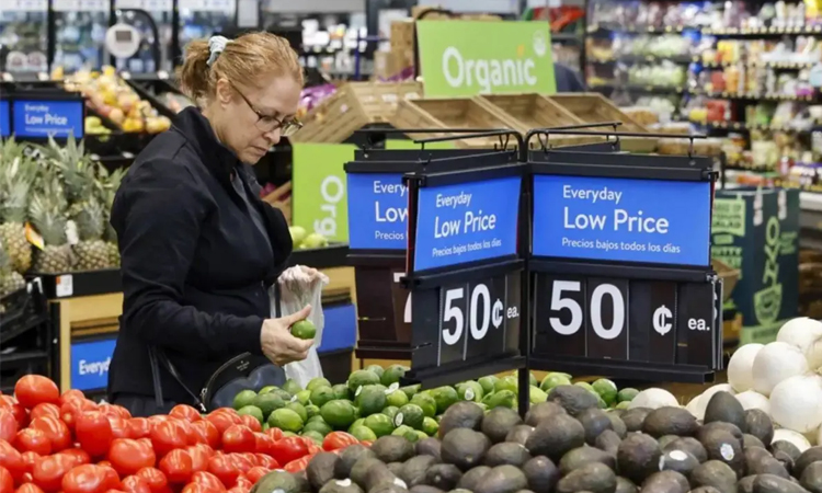US firms passing some cost hikes to consumers: Fed survey