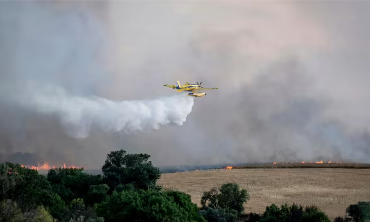 Spain taming fire that belched smoke cloud over Madrid