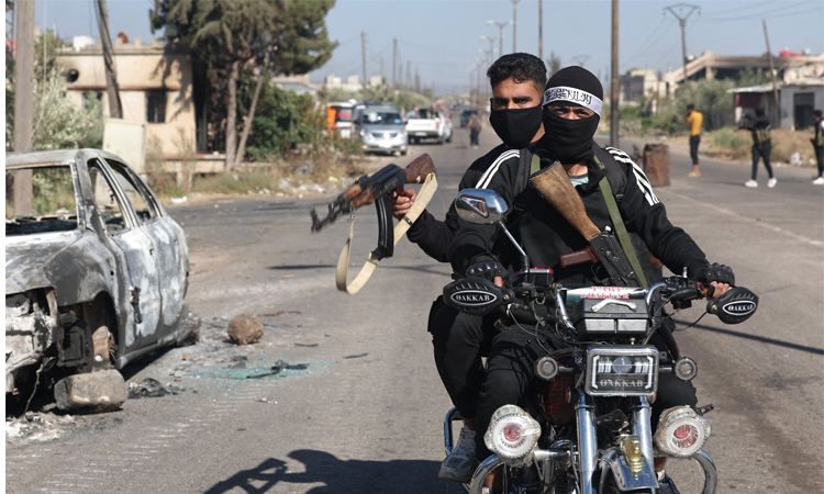 Death toll from south Syria violence rises to 718: monitor