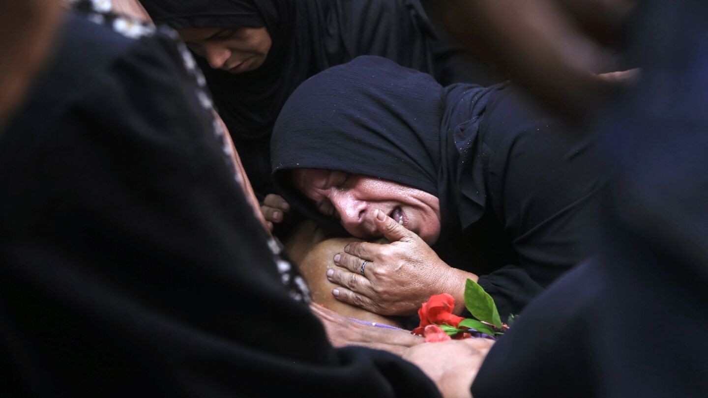 Gaza civil defence says Israeli fire kills 26 near two aid centres
