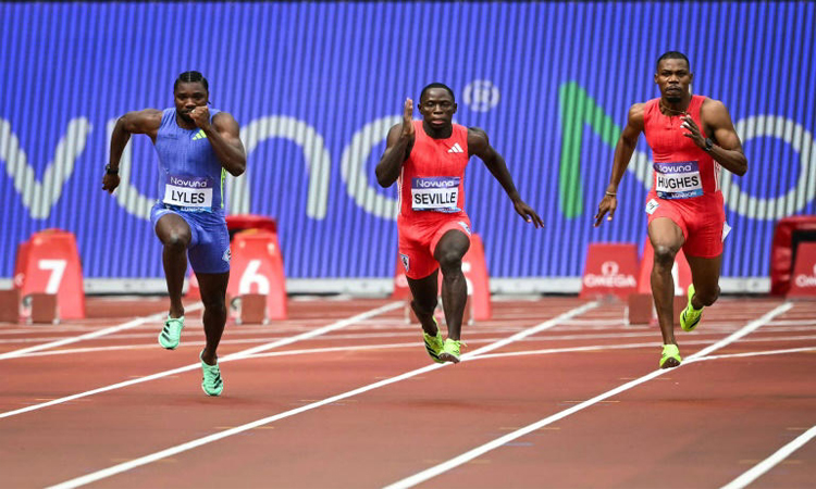 Alfred coasts in London, but Lyles pipped in season-opening 100m