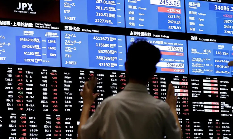 Tokyo stocks jump more than 3% on US trade deal