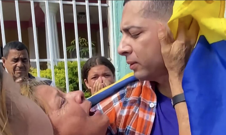 Tears of joy as Venezuelan migrants return from Salvadoran prison 'hell'